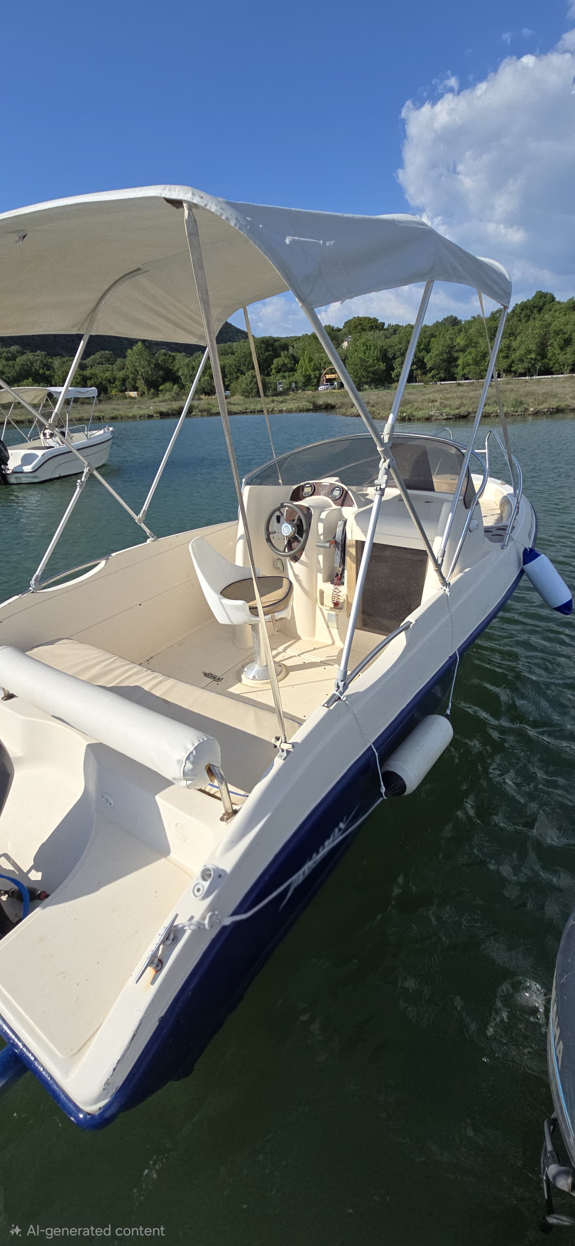 Cockpit view of Halolu Kiti 70HP speedboat with driver's swivel chair, steering wheel, and Bimini sun tent shade.