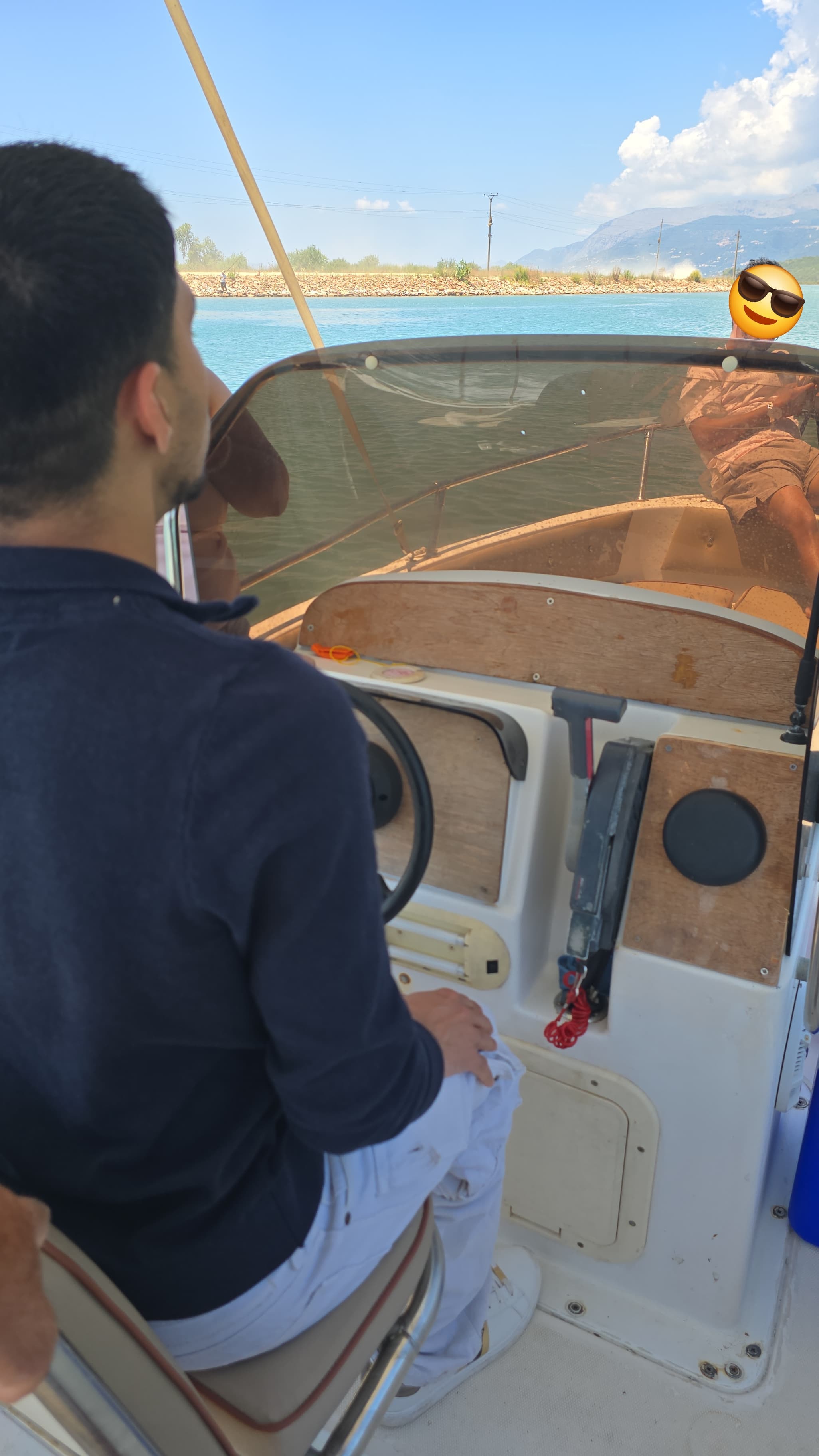 Speed Boat sailing near Ksamil panel view with captain navigating